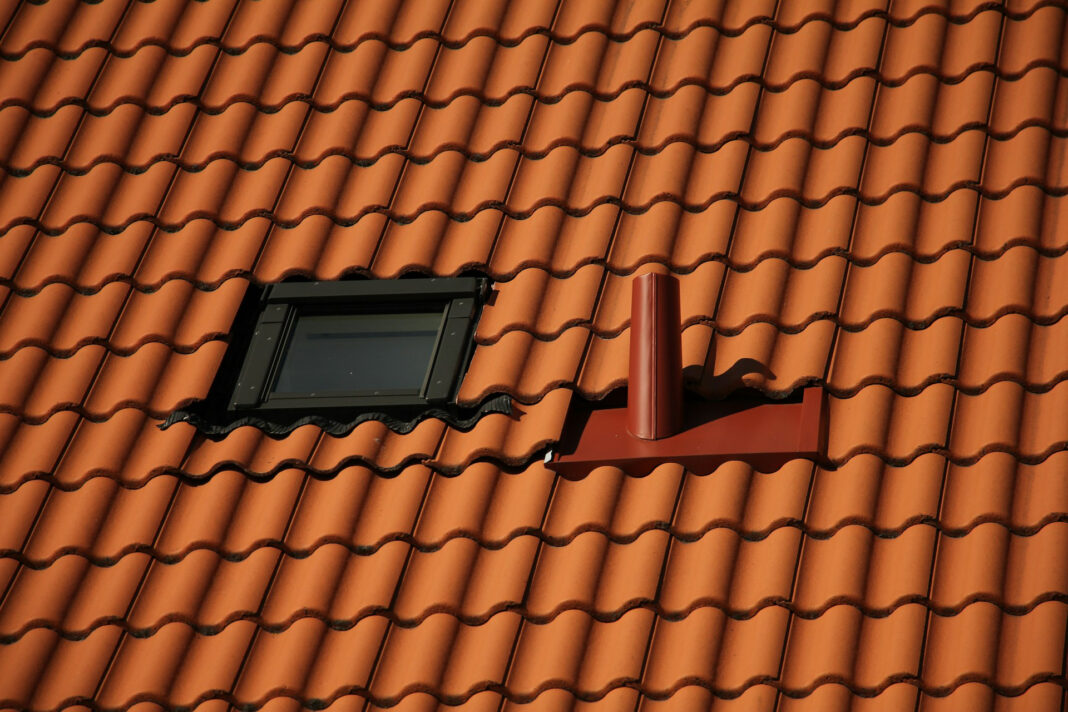 The roof of a home. Photo by John Kinnander via unsplash