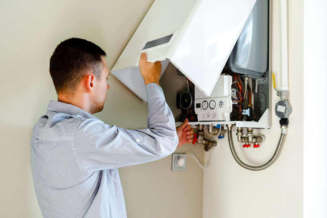 Water Heater Maintenance. Photo via adobe stock images