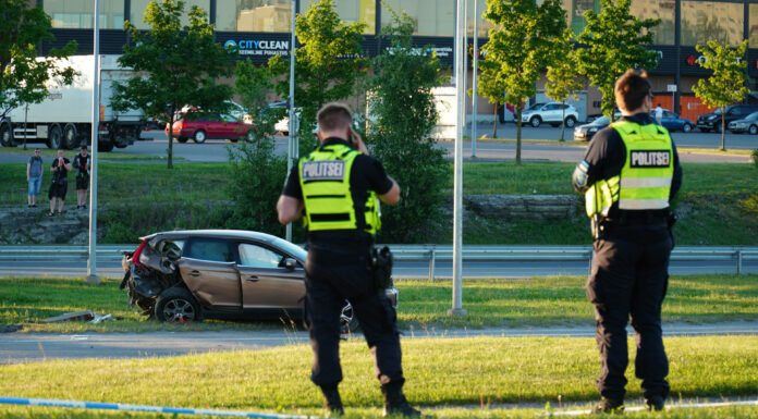 9 Crucial Steps to Follow When an Accident Occurs on Your Trip Two cops at a car accident sight. Photo by Llja Nedilko via unsplash