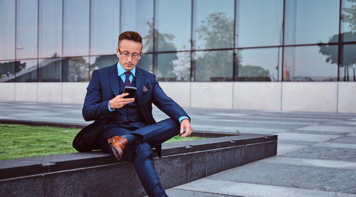 Tailoring Perfection for Every Occasion man wearing a tailored suit . Photo by fxquadro on Freepik