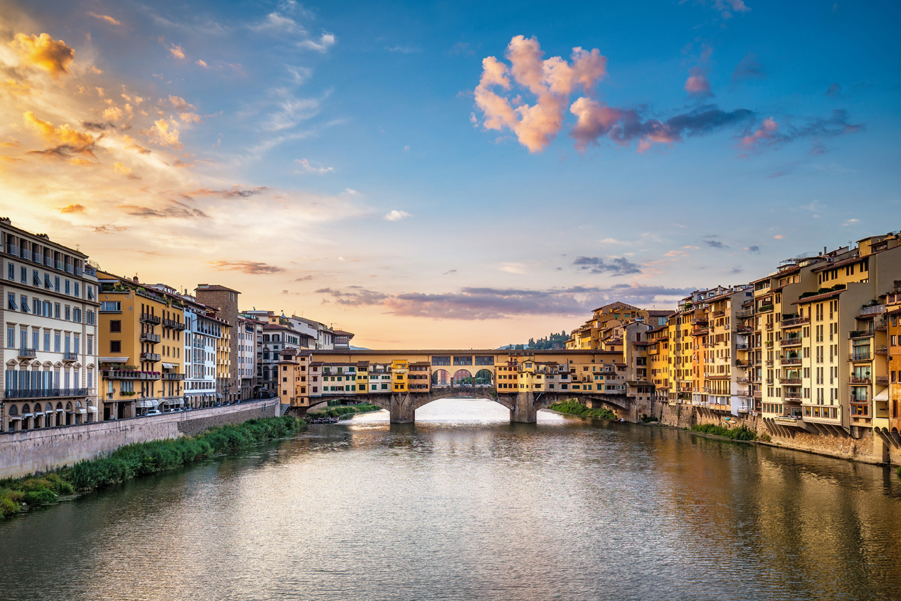 Sunrise over Ponte Vecchio in Florence, Italy, on a summer day Sunrise over Ponte Vecchio in Florence, Italy, on a summer day