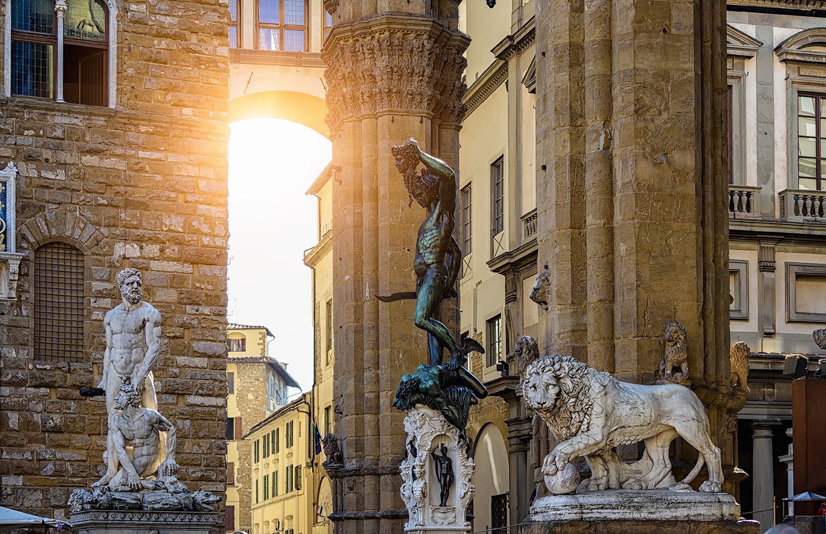 Sculpture of Loggia dei Lanzi and Palazzo Vecchio on Piazza della Signoria in Florence, Italy. Sculpture of Loggia dei Lanzi and Palazzo Vecchio on Piazza della Signoria in Florence, Italy.