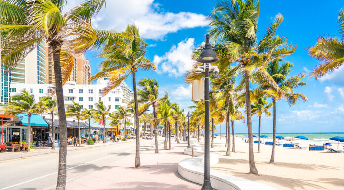 Fort Lauderdale’s Family Magic – Reasons Families Keep Coming Back Fort Lauderdale, Florida, USA - September 20, 2019: Seafront beach promenade with palm trees on a sunny day in Fort Lauderdale