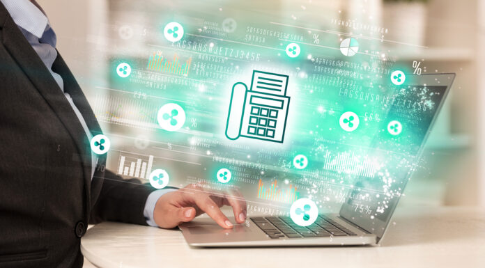 The Benefits of Switching to Online Faxing for Businesses Online faxing for businesses. Photo via ra2 Studio via adobe