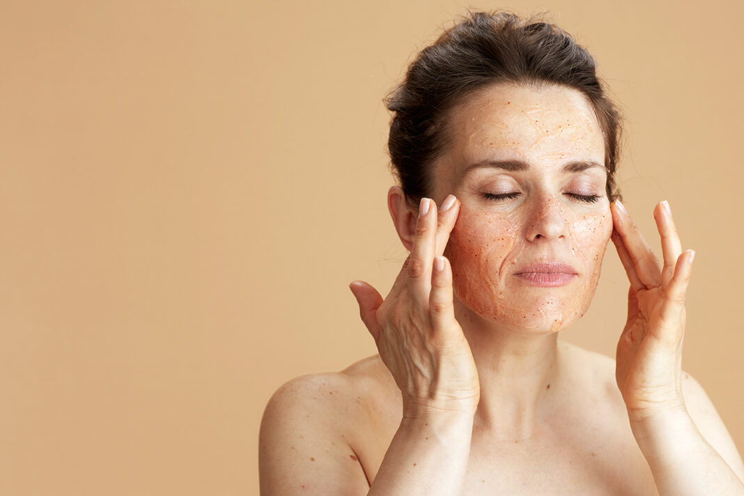 Woman using Retinol for her acne-prone skin. Photo by Alliance