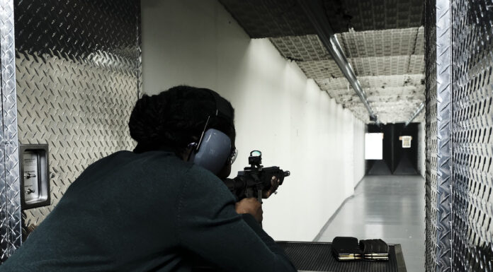 5 Reasons to Consider Going to a Shooting Range woman with a gun doing shootng range. Photo by pixabay