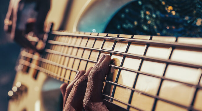 How Does a Bass Make Your Instrument Better? Bass Guitar Instrument. Photo by zorandim75 via adobe