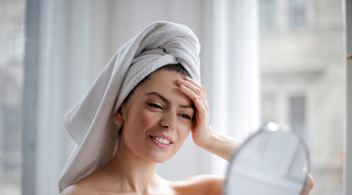 Essential Tips for Elevating Your Skincare Regime Woman taking care of her skincare. Photo by Andrea Piacquadio via pexels