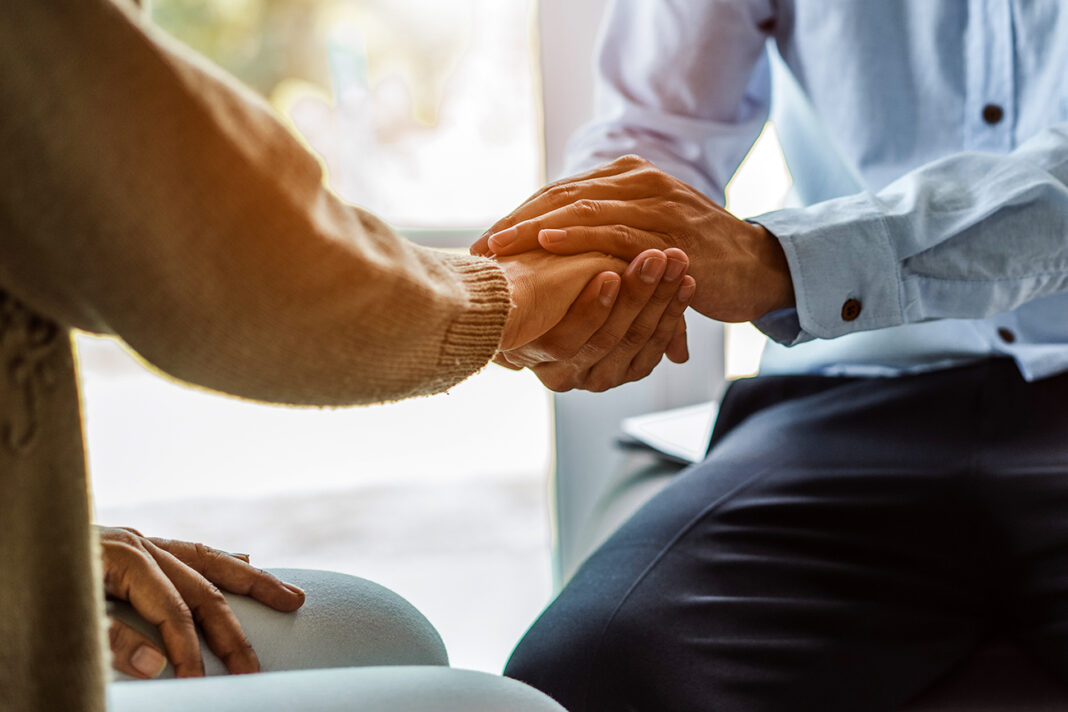 Emotional Support from a family caregiver. Photo by Pormezz via adobe