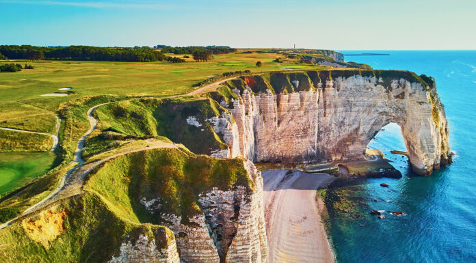 Why choose Normandy for your next Family Vacation? Etretat Normandy France. Photo by Ekaterina Pokrovsky via adobe