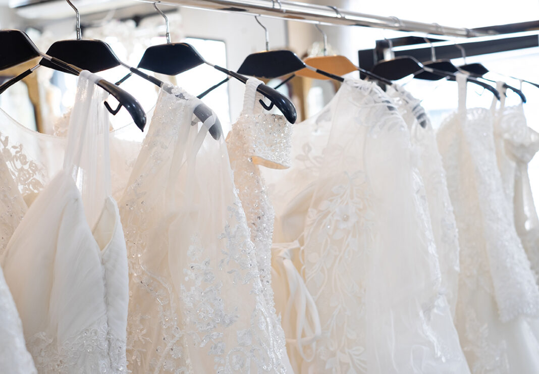 Wedding dress shopping. Photo by Otello Stpdc via adobe