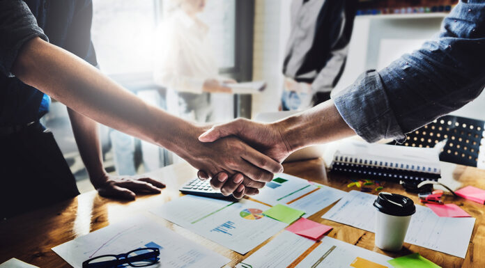 Collaborate to Elevate: How Partnerships Can Grow Your Social Media Presence Partnership to grow your social media precense. Photo by Itchaznong via adobe