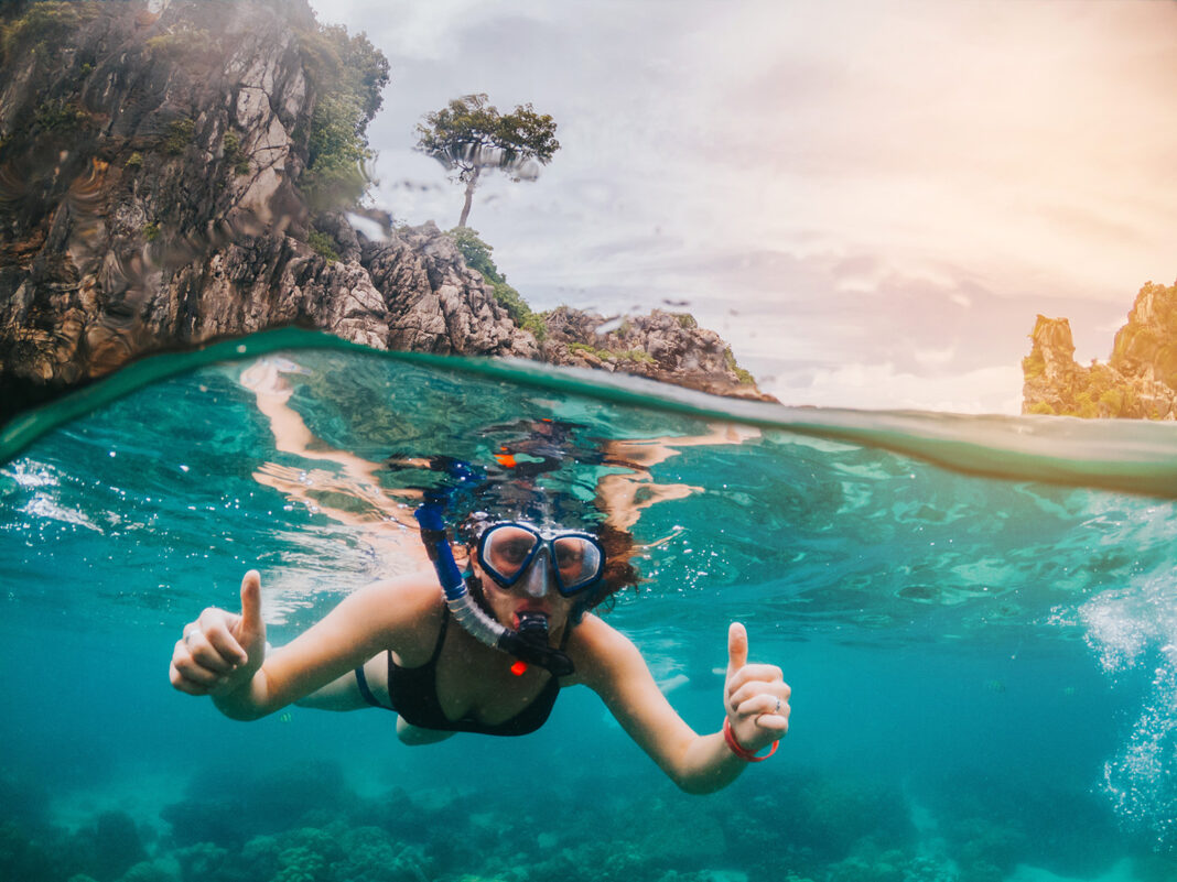 Snorkling first timer. PHoto by Belyaaa via adobe