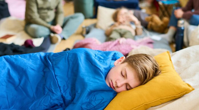 How to Keep Kids Warm in Their Sleeping Bags on Cold Nights Kids sleeping bags to keep warm at night. Image by Getty Images via unsplash