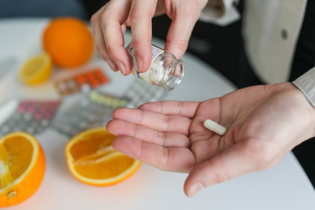 Medications and Supplements. Image via Pexels by Polina Tankilevitch