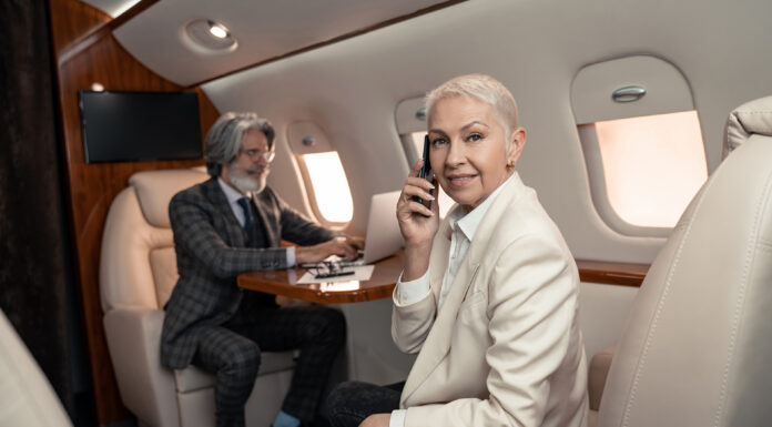 How the Ultra-Wealthy Travel: A Look into Private Jets, Luxury Cruises, and VIP Services Ultra-Wealthy individuals jetsetting. Photo by Lightfield Studios via adobe