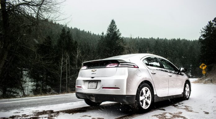 Why Chevy Vehicles Are a Top Choice for Drivers Today Chevy Vehicle parked on the sideroad. Photo by Colton Sturgeon via unsplash