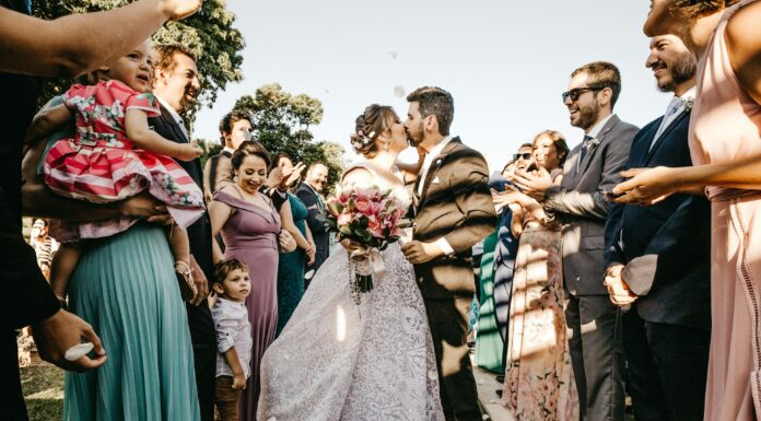 Kids at a Wedding Overseas: What to Pack for Comfort and Style Kids at a wedding overseas with their parents. Photo by Jonathan Borba via unsplash