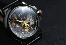 Black automatic self winding wristwatch with transparent sekelet
