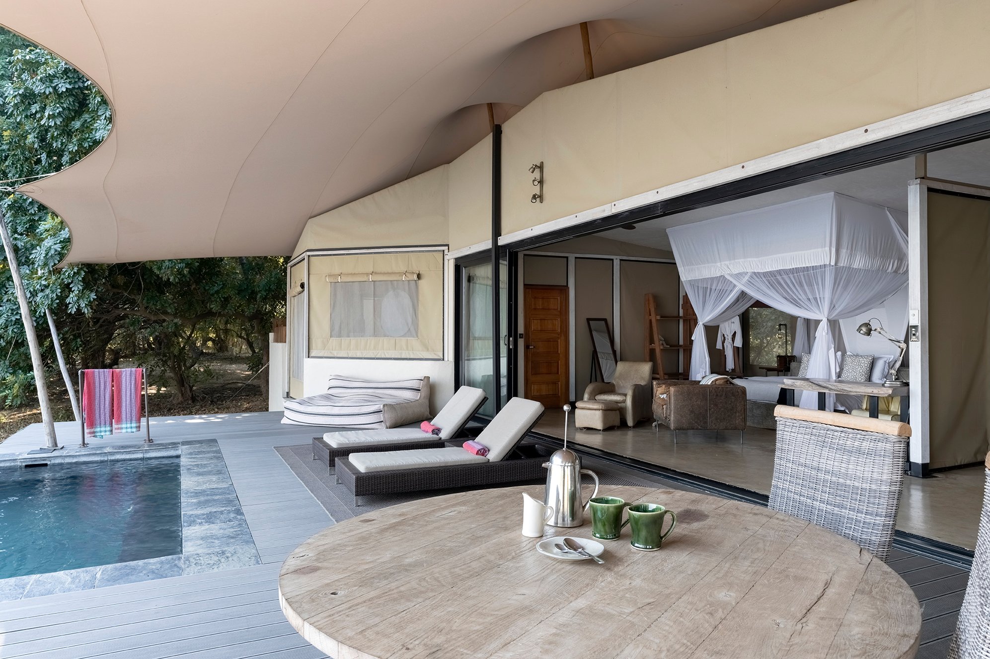 The tented suites have spacious outdoor decks. Photo courtesy of Green Safaris | Sausage Tree Camp The tented suites have spacious outdoor decks. Photo courtesy of Green Safaris | Sausage Tree Camp