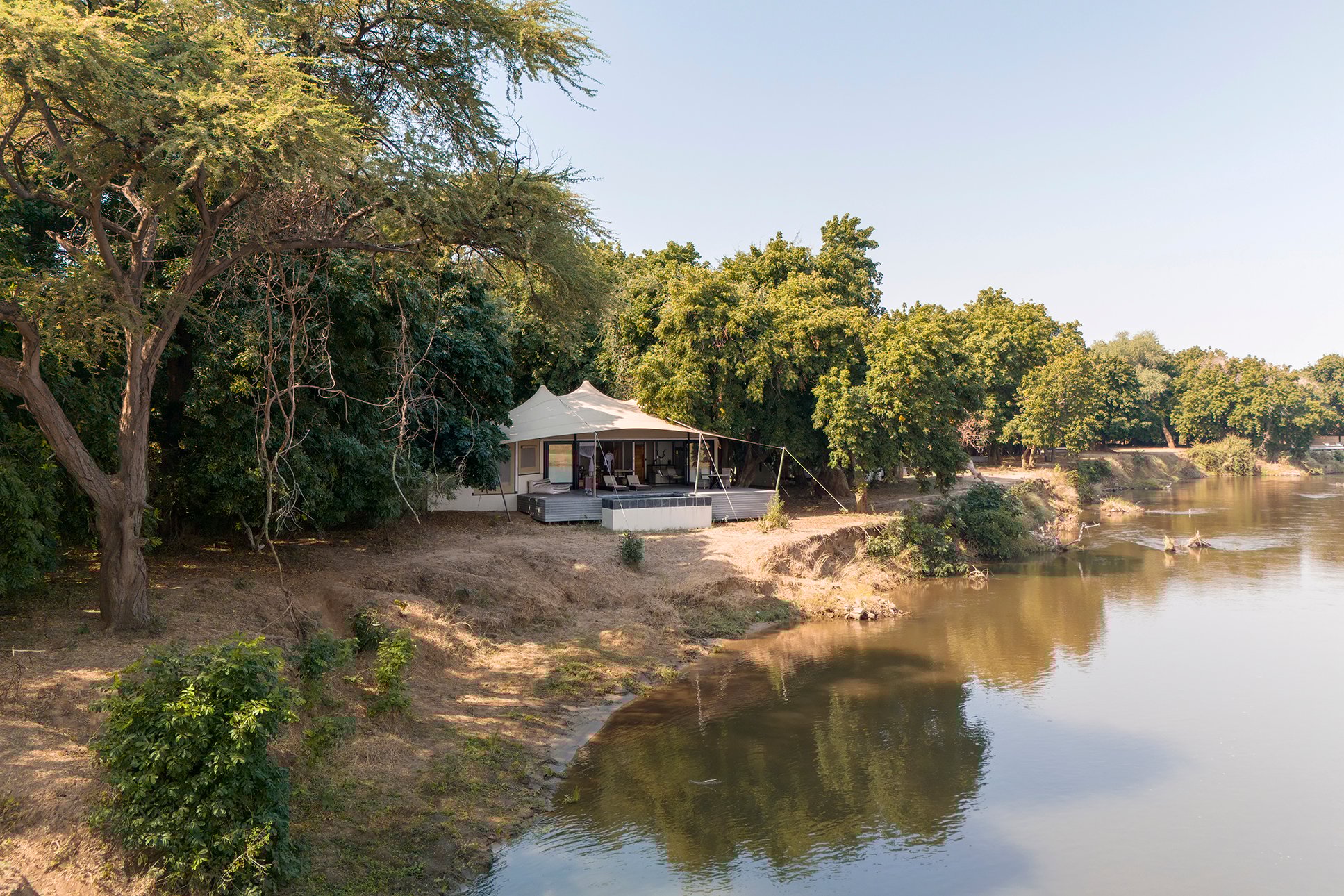 My tented suite is at the end of a sandy path. Photo courtesy of Green Safaris | Sausage Tree Camp My tented suite is at the end of a sandy path. Photo courtesy of Green Safaris | Sausage Tree Camp
