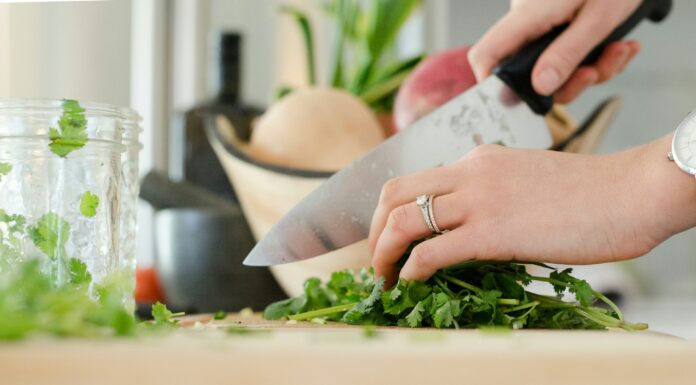 5 Easy Ways to Upgrade Your Cooking Skills at Home Working on her cooking skills at Home. Photo by Alyson Mcphee via unsplash