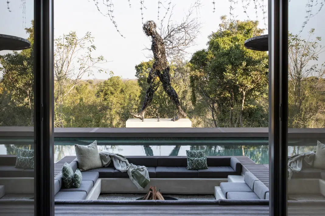 A sculpture entitled ‘Twigs’ forms a striking focal point next to the pool. Photo courtesy of Akara Design Studio