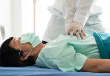 a doctor performing CPR on a patient