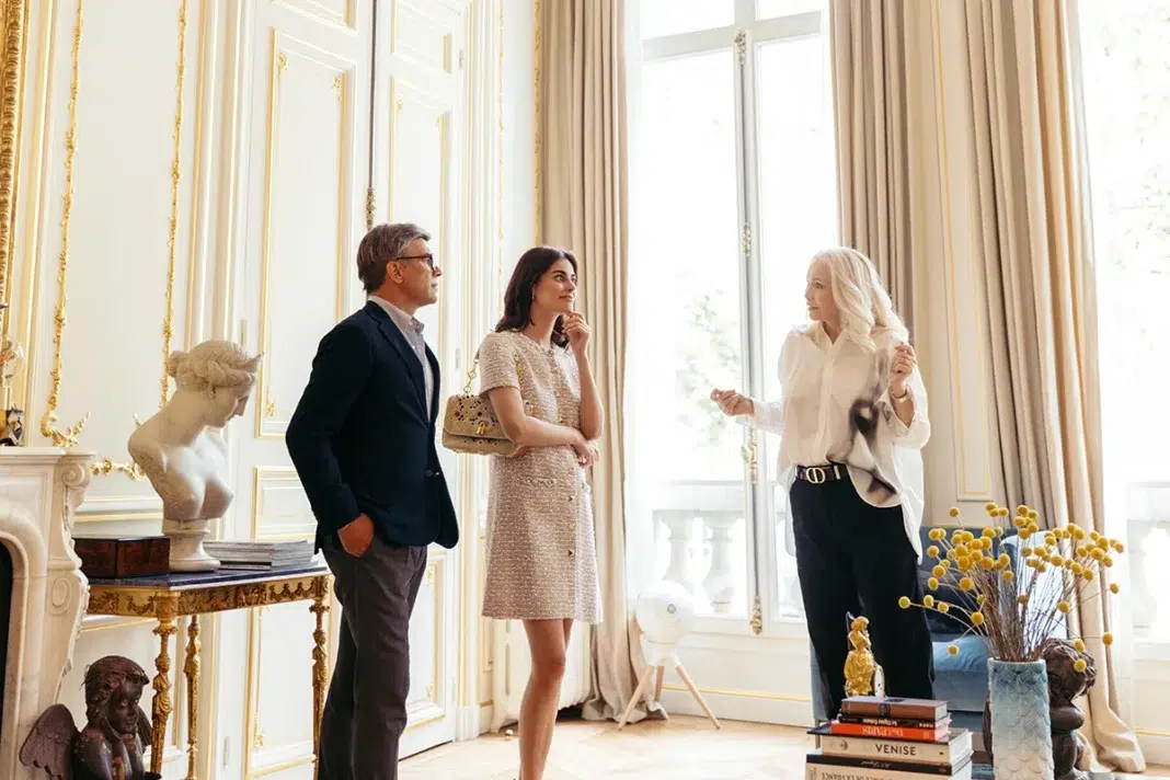 A Realtor from Coldwell Banker Europa Realty helping their client find a property