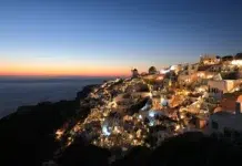 Luxury European Escapes: Where to Go Beautiful sunset at Oia on Santorini Island, Greece Free Photo