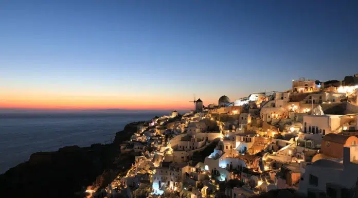 Luxury European Escapes: Where to Go Beautiful sunset at Oia on Santorini Island, Greece Free Photo