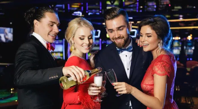 High Stakes and High Fashion: How Casinos Are Influencing Lifestyle Trends Elegant people wearing high fashion in a luxury casino celebrating. Photo via vecteezy by Anatoliy J