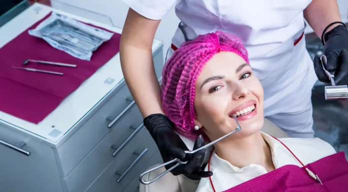 How a Dentistry License Attorney Helps Dentists Protect Their Practice A dentist examining a patient's teeth. Photo vecteezy-medium