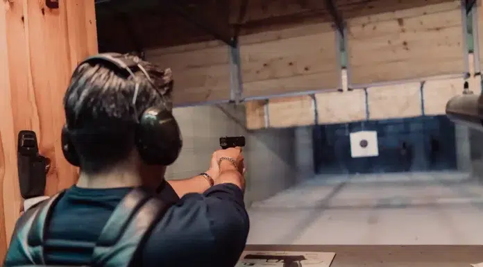 How Responsible Firearm Ownership Starts with Education and Safe Practices A man practicing shooting at a firearm school. Photo vecteezy-medium