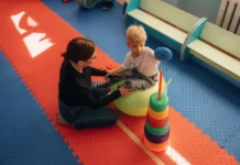 8 Core Skills Strengthened Through ABA Therapy A woman and an autistic child going through ABA Therapy. Photo vecteezy-medium