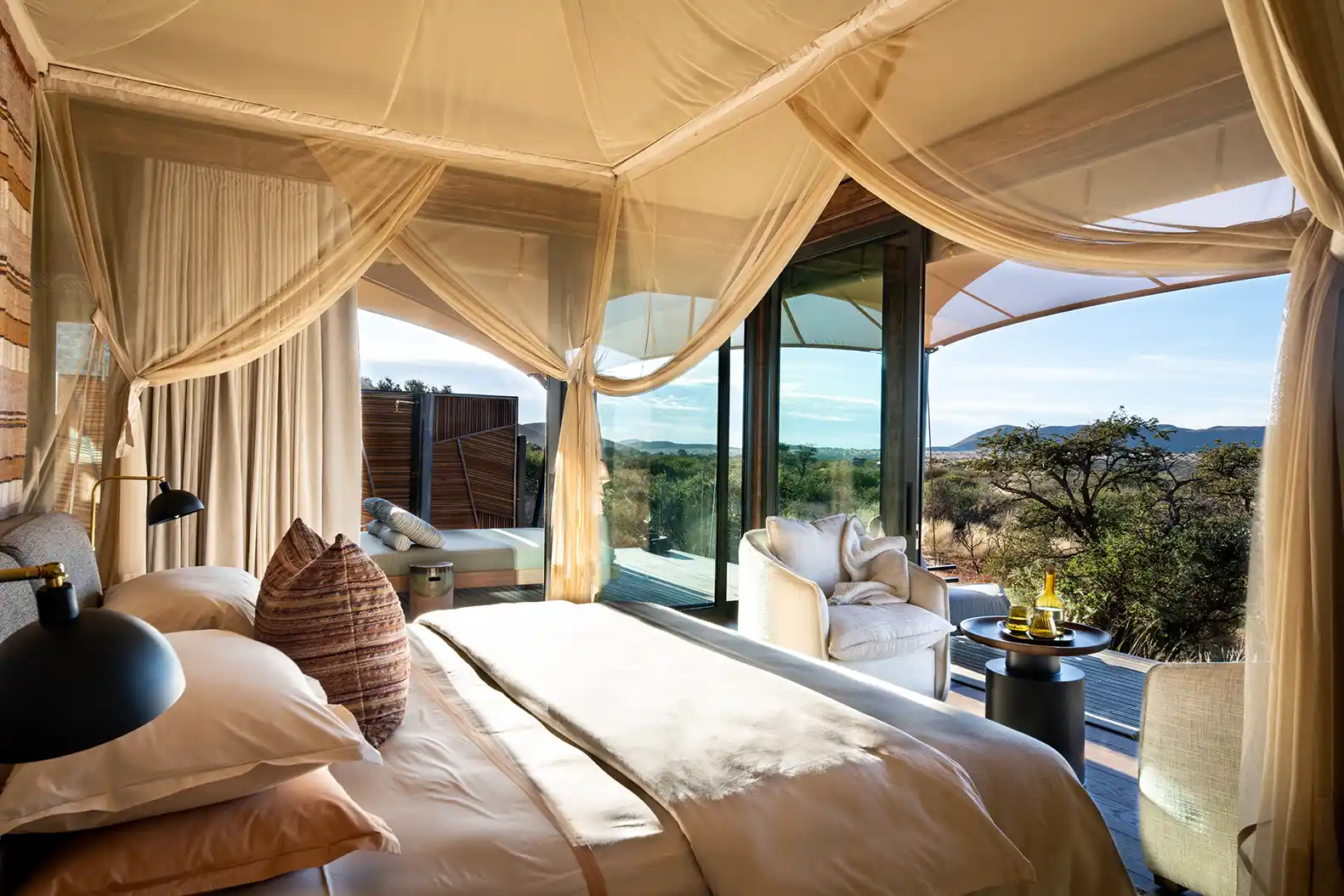 The dreamy bedroom has gorgeous vistas over the landscape. Photo courtesy of Tswalu | Andrew Morgan The dreamy bedroom has gorgeous vistas over the landscape. Photo courtesy of Tswalu | Andrew Morgan