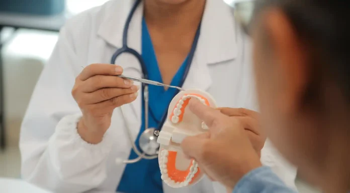 How Oral Appliance Therapy Provides Comfortable Apnea Management dentist talking about Oral Appliance Therapy with his patient. Photo vecteezy-medium