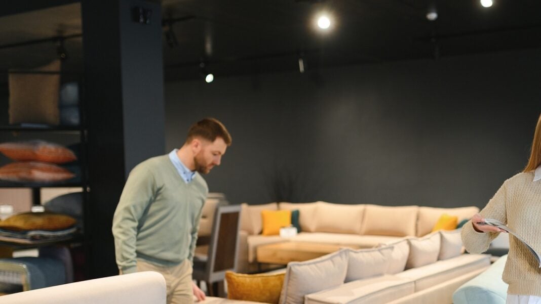 Happy couple choosing furniture in store Happy couple choosing furniture in store.