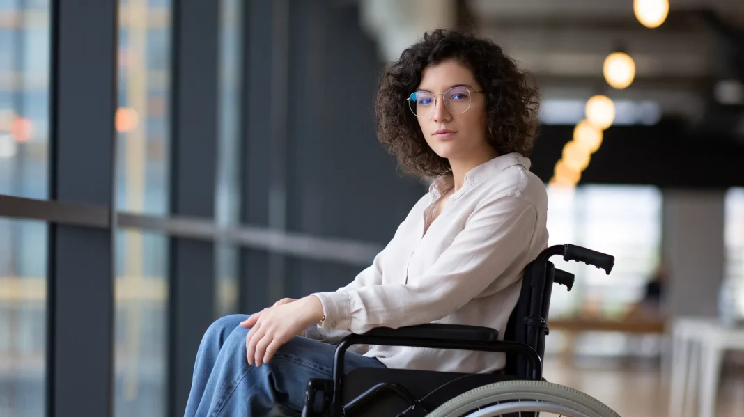 A Woman in a wheelchair placing a disability claim in Ottawa. Vecteezy-medium A Woman in a wheelchair placing a disability claim in Ottawa. Vecteezy-medium