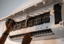 What Are the Benefits of an AC Tune-Up? Getting the AC Tune Up by a professional. Vecteezy-medium