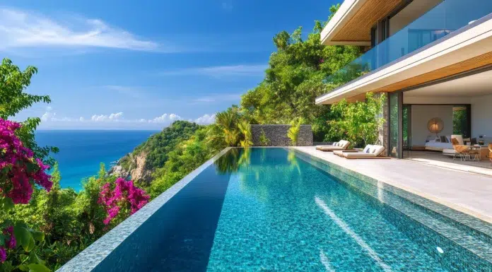 The Growing Appeal of Vacation Rentals Among Travelers Seeking Local Experiences Infinity pool overlooking the ocean at a vacation rental. vecteezy-medium