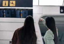 How Smart Travelers Cut Costs Without Sacrificing Comfort Traveling people at the airport. Vecteezy-medium
