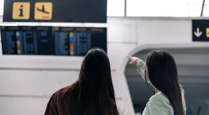 How Smart Travelers Cut Costs Without Sacrificing Comfort Traveling people at the airport. Vecteezy-medium