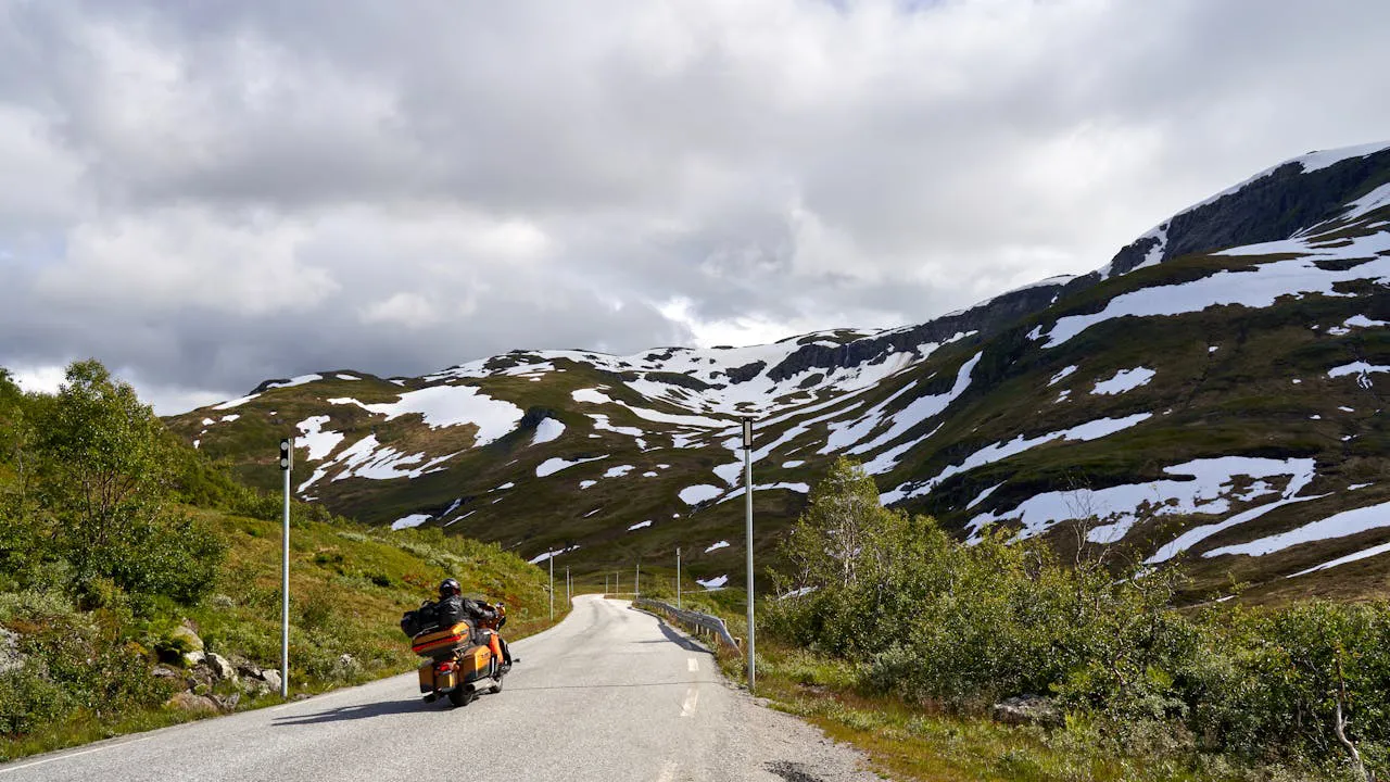 a man comfortable cruising on his motorcycle. Photo by Barnabas Davoti via pexels a man comfortable cruising on his motorcycle. Photo by Barnabas Davoti via pexels