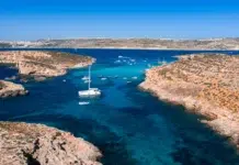 Blue Lagoon Comino: Is It Really Worth the Hype? aerial view of the blue lagoon at comino island malta. Vecteezy-medium