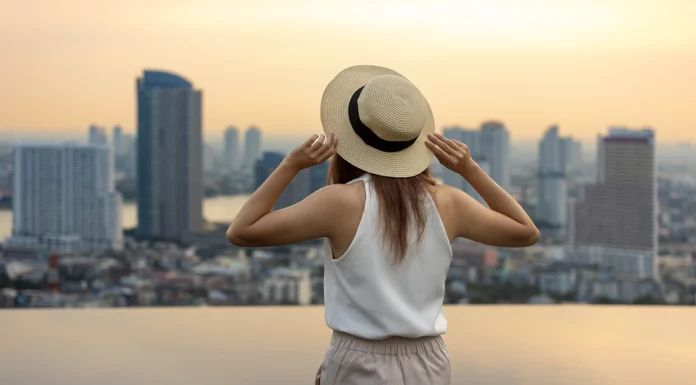 How to Spend a Perfect 48 Hours in a Luxury City Escape pretty tourist-woman-is-relaxing-and-enjoying-her luxury city escape. Vecteezy-medium