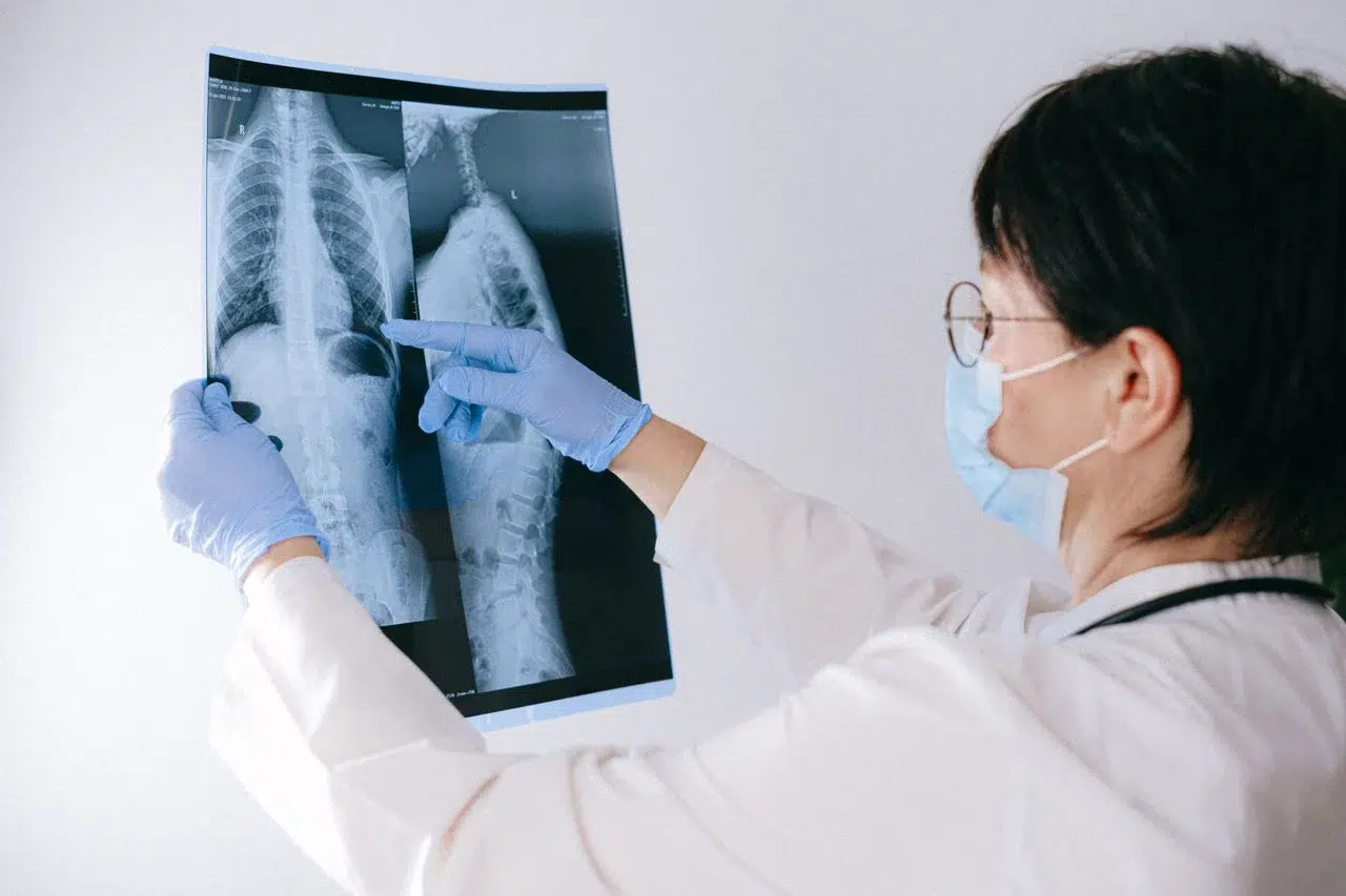A pain specialist reviewing a scan with a patient. Photo via pexels by Shvetsa A pain specialist reviewing a scan with a patient. Photo via pexels by Shvetsa