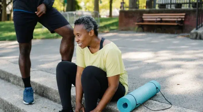 Modern Pain Treatments That Keep You Moving An active adult stretching outdoors. Photo via pexels by Liliana Drew