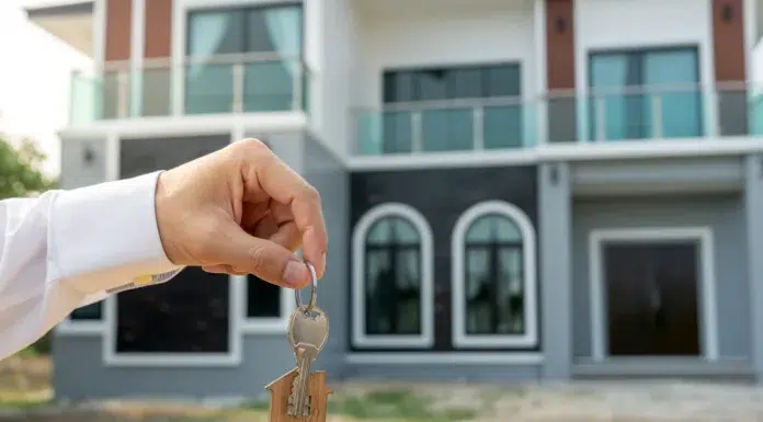 A Beginner’s Guide to Real Estate Investment: Multi-Family Properties Explained Person holding Silver Key with Clear Gemstone. Vecteezy-medium