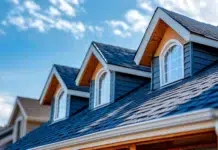 How to Evaluate a Roofing Company Before Investing in a Major Home Improvement Project Roofing Company performing a home improvement. Vecteezy-medium